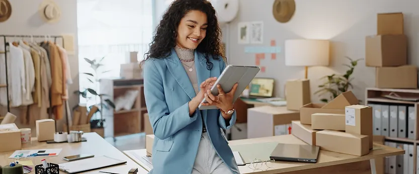 Business owner checking insurance inventory on tablet